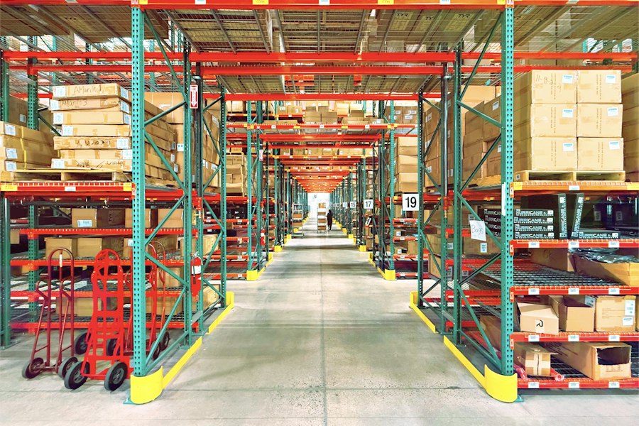 Frozen storage aisle lined with stocked racking